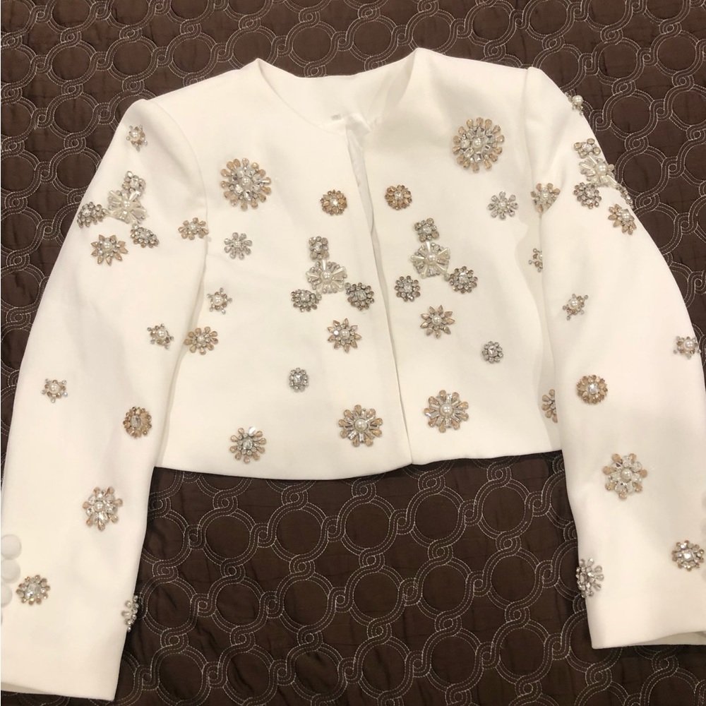 Bella Barnett White suit